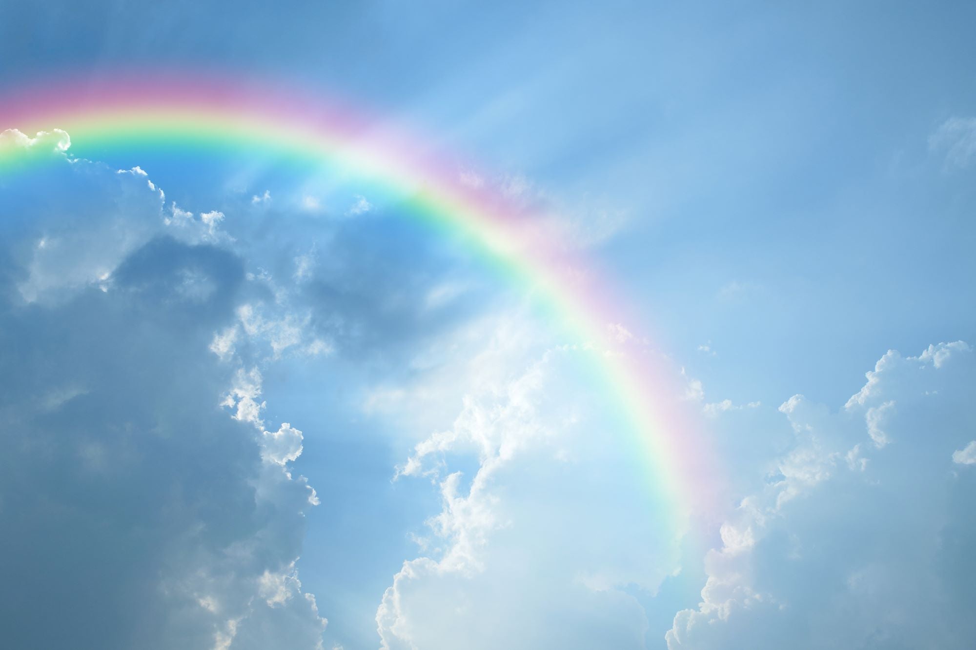 Rainbow in Blue Sky