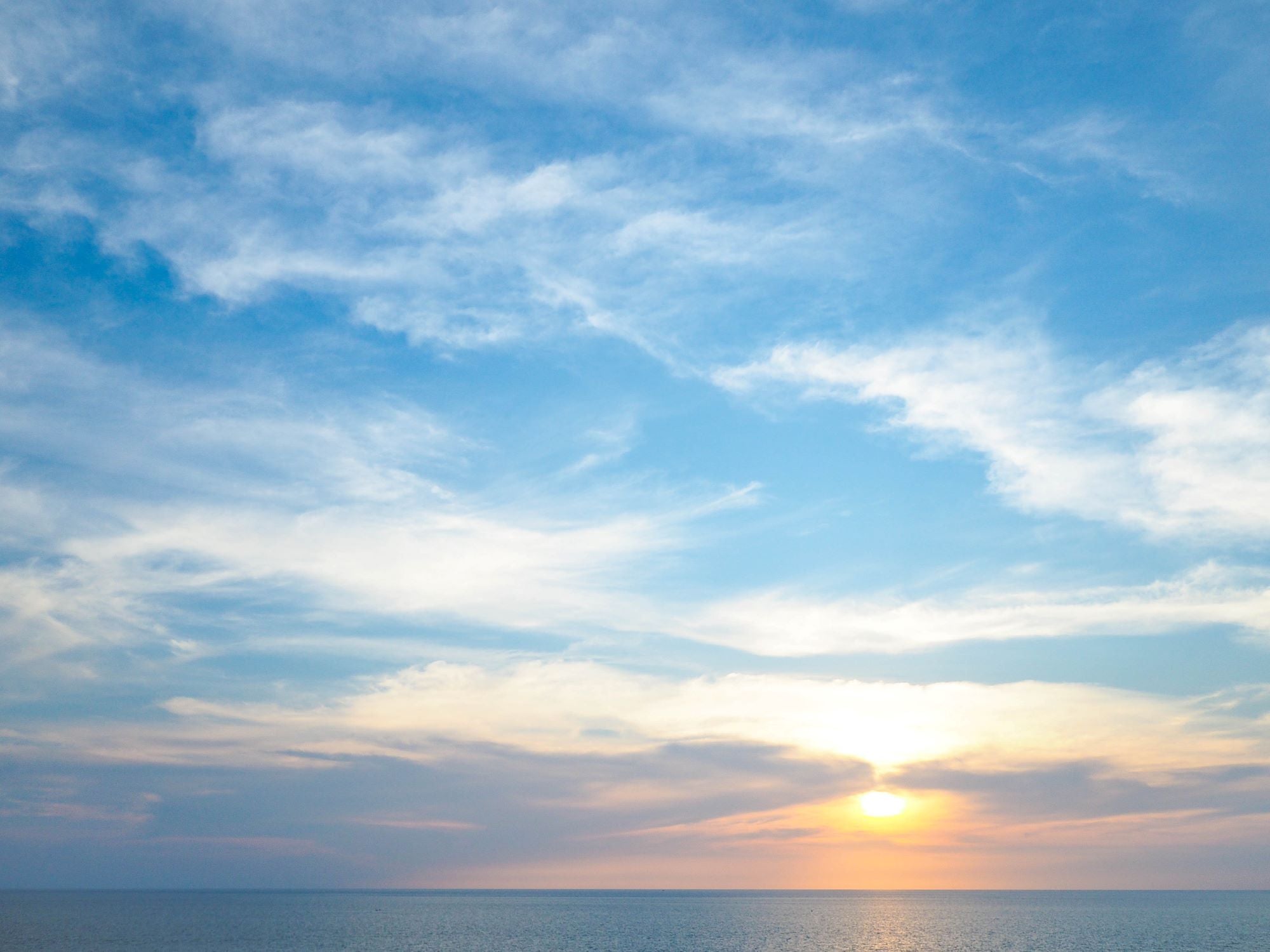 Tranquil Sunset Over Calm Ocean