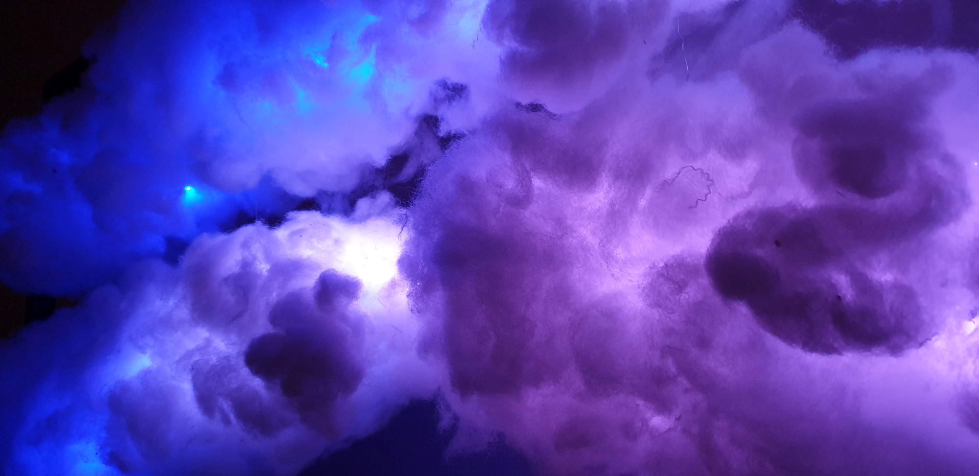 Vibrant Purple and Blue Cloud Glow