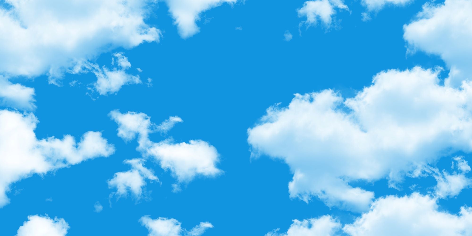 Bright Blue Sky with Soft Clouds