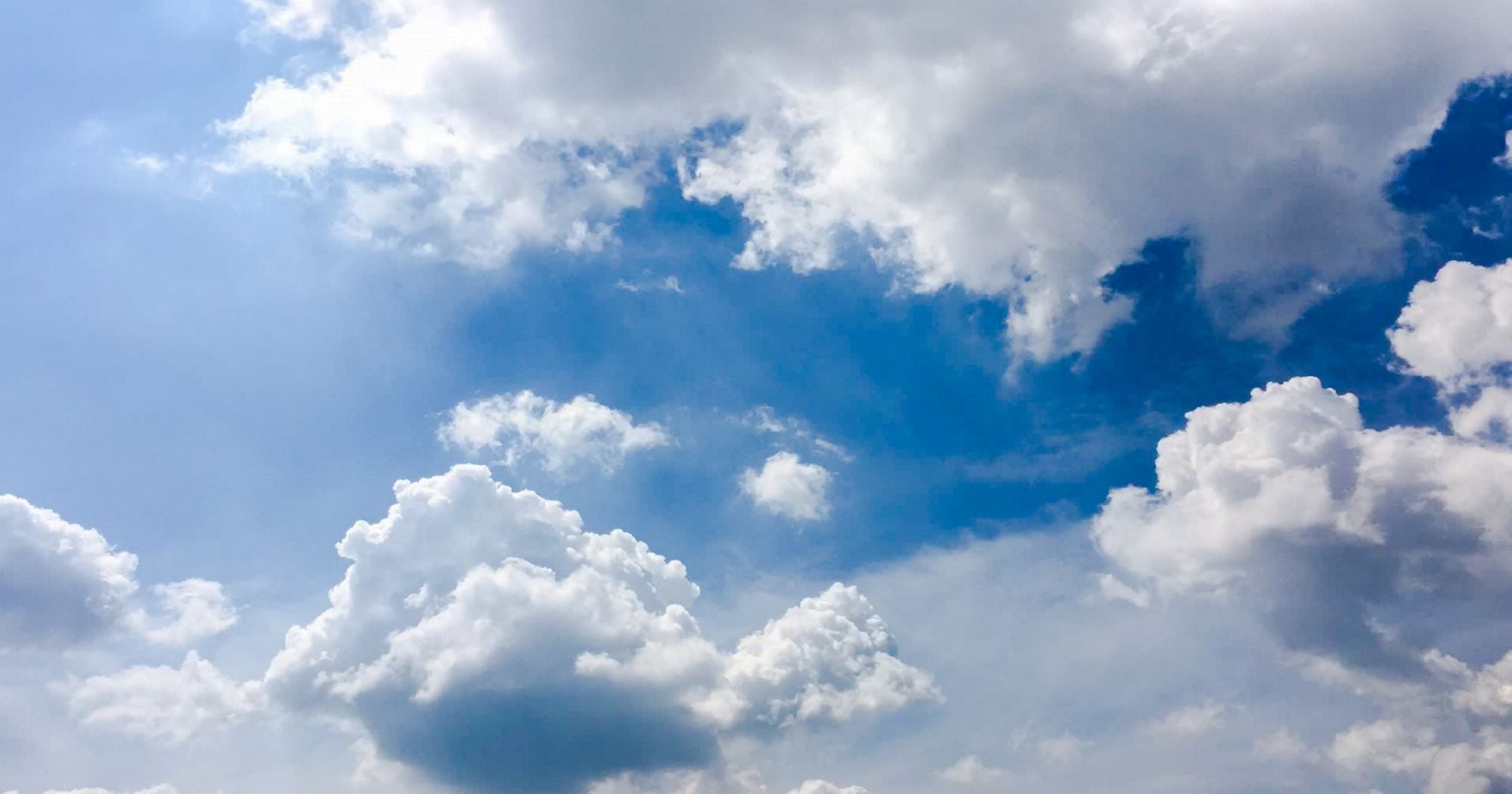 Soft Clouds Blue Horizon