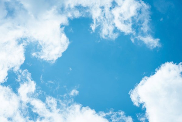 Bright Blue Sky Framed with Fluffy White Clouds