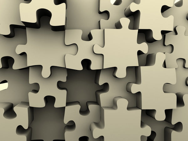 3D Puzzle Pieces in Monochrome Arrangement