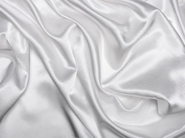 Elegant White Satin Fabric with Soft Folds
