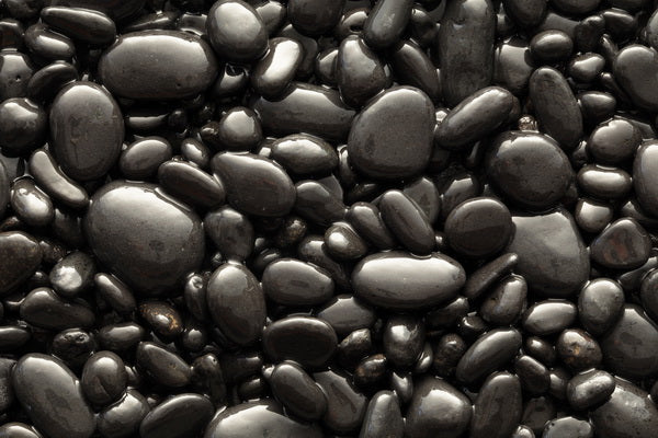 Glossy Black Pebbles in a Natural Arrangement