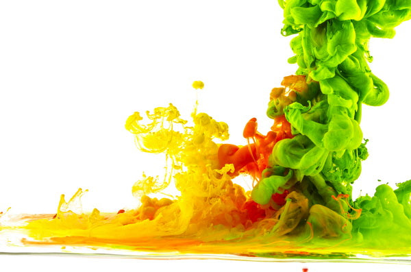 Fusion of Vibrant Green and Yellow Ink in Water Flow