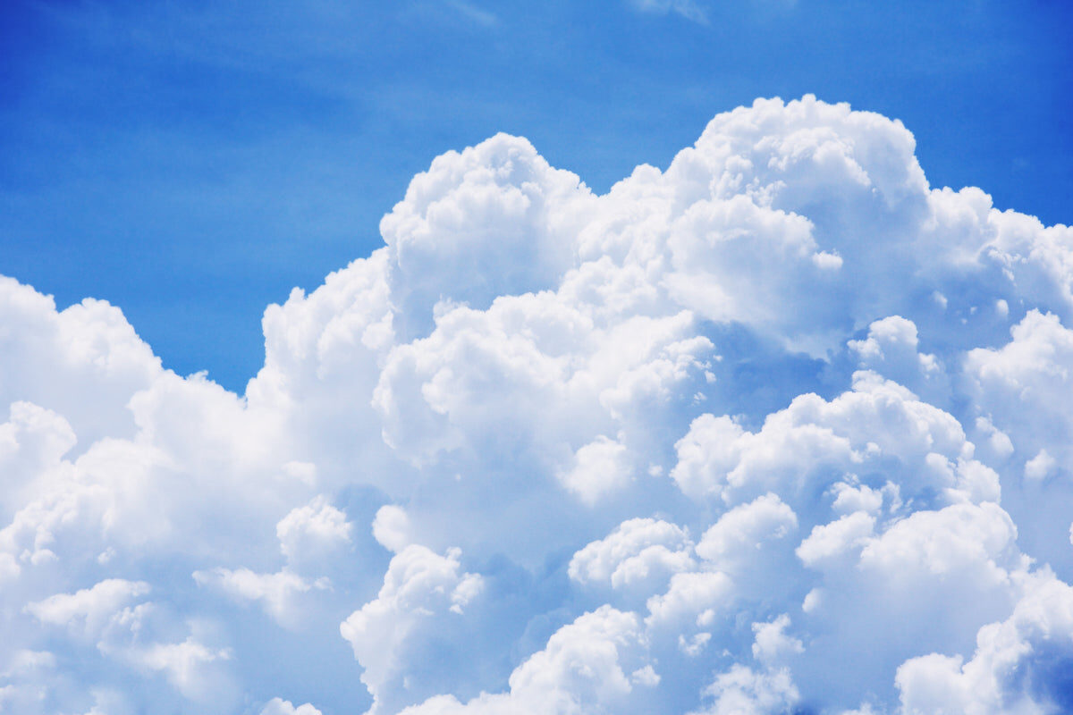 Bright Blue Sky with Puffy White Clouds