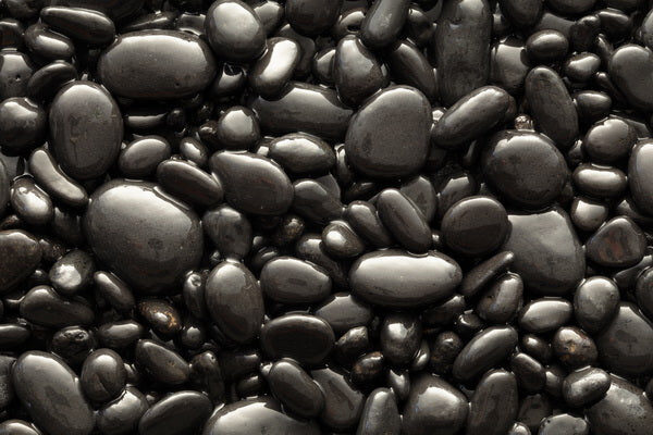 Glossy Black Pebbles in a Natural Arrangement
