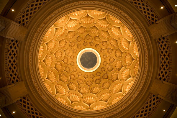 Ornate Ceiling: A Golden Dome with Intricate Shell Patterns