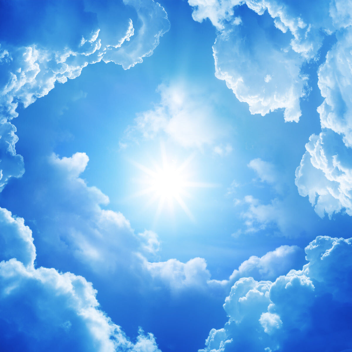 Radiant Sky with Sunburst & Fluffy Cloud Design