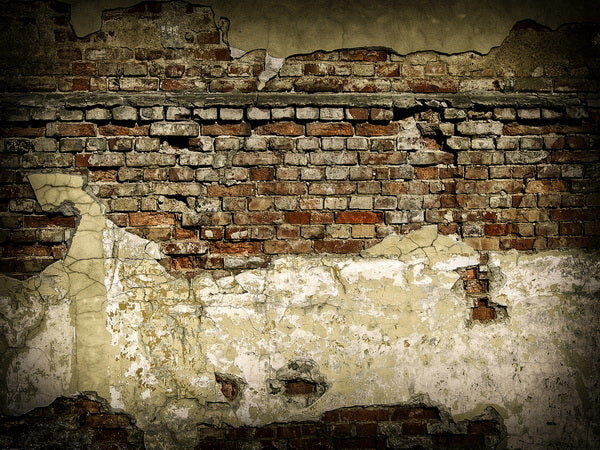Weathered Brick Wall with Peeling Plaster